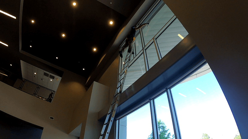 Floor-to-ceiling glass — custom windows requiring in-person assessment